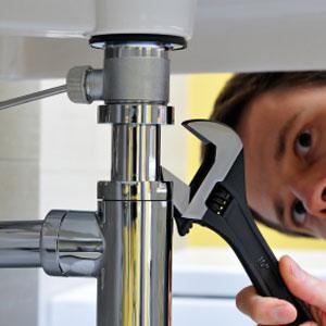 A Goodyear Plumbing Contractor Repairs a Sink